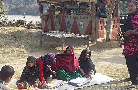 Van Gujjar girls study near their encampment in Mohand, Uttar Pradesh. Photo: Pranav Menon