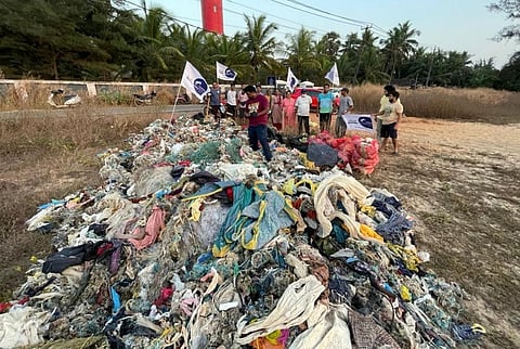 Volunteers collect trash on the Kodi beach in Kundapur. Photo: M Raghuram