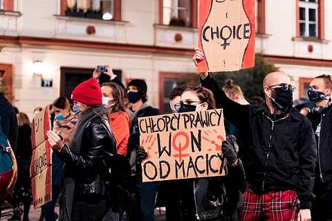 People protesting Poland’s near-total abortion ban. Salvatore Allotta / Shutterstock