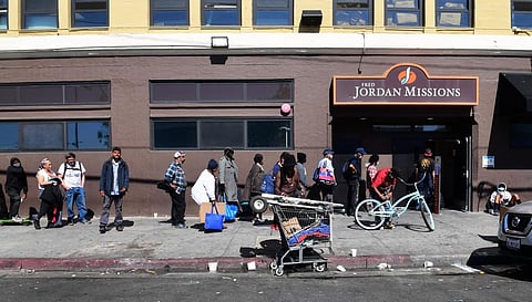 People wait in line for a free morning meal in Los Angeles in April 2020. High and rising inequality is one reason the US ranks badly on some international measures of development. Photo: Frederic J Brown/ AFP via Getty Images