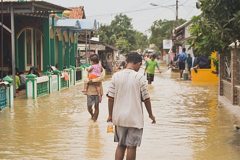 Flood warning systems can't prevent floods, but they provide advance notice to allow authorities to react ahead of time. Photo: Misbahul Aulia, Unsplash