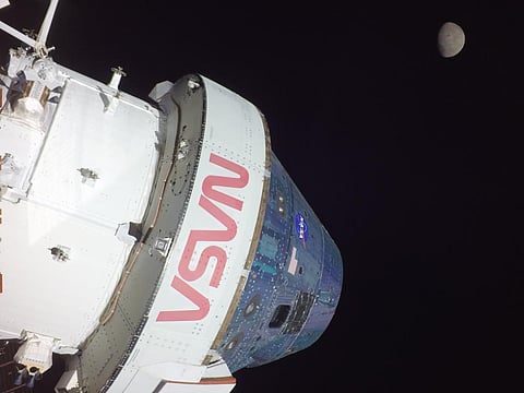A camera mounted on the tip of one of the Orion capsule’s solar array wings captured this footage of the spacecraft and the Moon. Photo: NASA