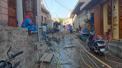The plastic pipes carrying water to houses without connection extend to 100-150 feet. Photo: Anuj Behal