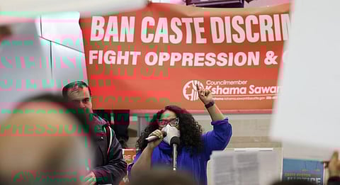 Speakers discussing the proposed ordinance to add caste to Seattle’s anti-discrimination laws at Seattle City Hall, on Feb. 21, 2023. AP Photo/John Froschauer