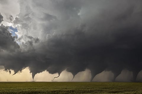 A series of images in this photo montage shows the evolution of a tornado. Photo: JasonWeingart via Wikimedia, CC BY-SA
