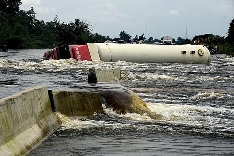 Forecasting, risk plans and effective drainage systems can mitigate the impact of severe floods. Photo by Pius Utomi Ekpei/AFP via Getty Images