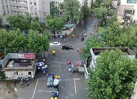 Climate change is expected to accelerate sea-level rise and coastal cities such as Shanghai are most at risk of increased flooding. (Flood in Shanghai by Carsten Ullrich is available at https://bit.ly/3NGwcbl)