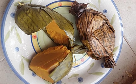 Okpa, a local delicacy made from Bambara beans, is commonly wrapped in leaves.
