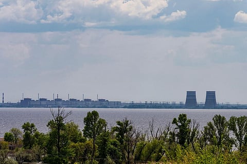 View of Zaporizhzhya nuclear power plant from right banks of Dnipro river. Photo: Sipa/Alamy