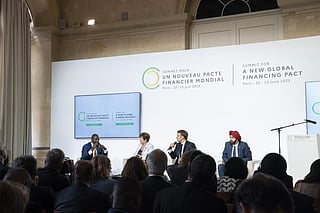 French President Emmanuel Macron (second from right) and Ajay Banga from the World Bank (Right). Photo: @EmmanuelMacron / Twitter