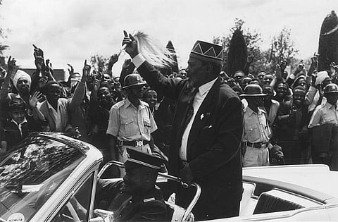 Kenya’s first president Jomo Kenyatta waves at a crowd. Photo: Harry Benson/Getty Images