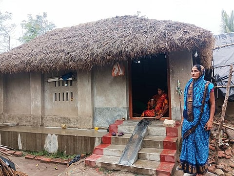 Sita Maity standing in front of her house in Jagatsingpur. Photo: Debabrata Patra.