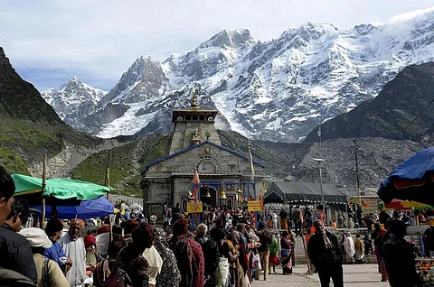 Hindu devotees worship at the Kedarnath Temple in the northern Indian state of Uttarakhand