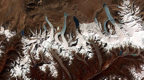 Glacial lakes are common in the Himalayas, as this satellite view shows. Some are dammed by glaciers, other by moraines. Image: NASA