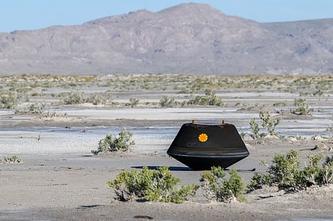 The sample return capsule from NASA's OSIRIS-REx mission is seen shortly after touching down in Utah, September 24, 2023. The sample was collected from the asteroid Bennu in October 2020. Photo: NASA / Keegan Barber
