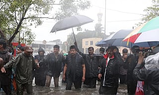 DMK Leader Udhay Stalin wades through the flooded streets of Chennai. Photo: @Udhaystalin / X