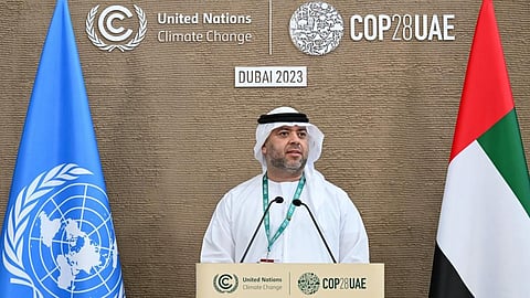 Majid Al Suwaidi, Director-General and Special Representative of COP28, speaks to media at the UN Climate Change Conference COP28 at Expo City Dubai on December 12, 2023, in Dubai, United Arab Emirates. (Photo by COP28 / Anthony Fleyhan)