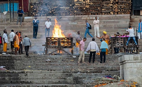 A cremation in progress at Manikarnika Ghat in Varanasi. Photo from iStock for representation use