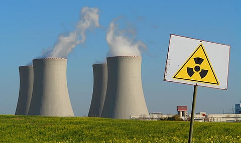 An iStock representative photo of a nuclear power plant with a radioactivity sign