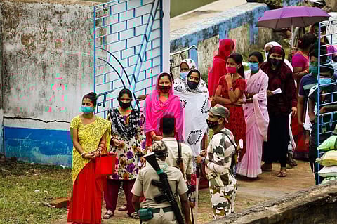 People queue up to vote for West Bengal Assembly Election 2021. Photo: iStock