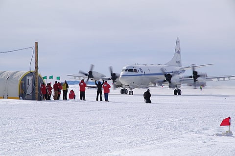 A plane landing at an Antarctic research station