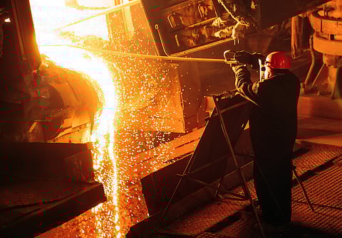 Man working at an electric arc furnace
