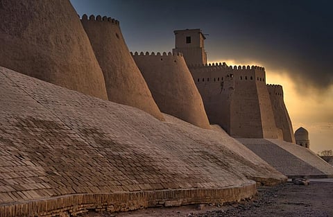 Last daylight at the city walls of the ancient city of Khiva, one of the most famous places on the historic Silk Road.