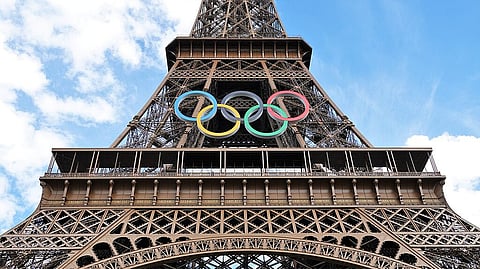 Close up of Eiffel Tower in paris, France, showing the Olympics logo