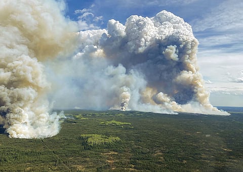 The Parker Lake wildfire in Canada prompted an evacuation order and emergency alert for the town of Fort Nelson in British Columbia province on May 13 (Photograph: Reuters)