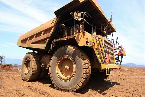 A big yellow dump truck used to transport mining material in nickel mining