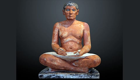 The Seated Scribe, 2613–2494 BC; painted limestone and inlaid quartz.