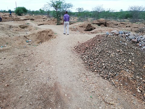 This road in Zimbabwe is unusable after artisanal miners dug pits along it.