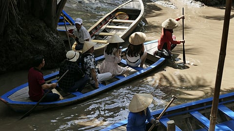 People on boats on the Mekong