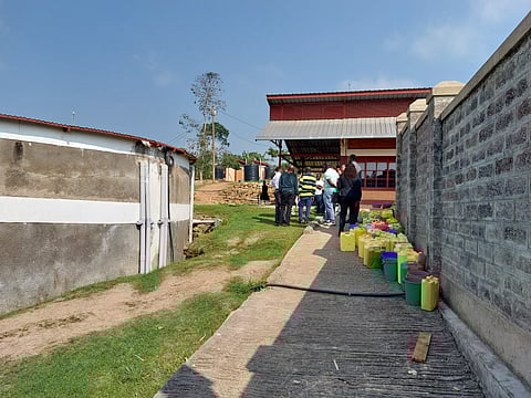 Rainwater harvested from the rooftops of classrooms is collected in a 250 cubic metres cement tank and used for drinking after filtration through UV filters. Students and the staff carry water from the tank (left) to their rooms using jerry cans