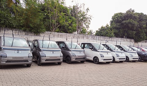 A Picture of orderly parked Compact Electric cars named Comet at the Morris Garages showroom in Mysuru city, India.