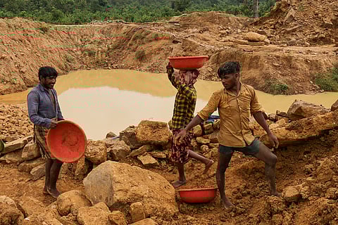 Arvind Gond (right),has been a labourer since the age of twelve. He currently works in a diamond mine.