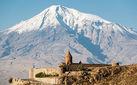 The ancient Armenian church Khor Virap with the Biblical Mount Ararat in the background.