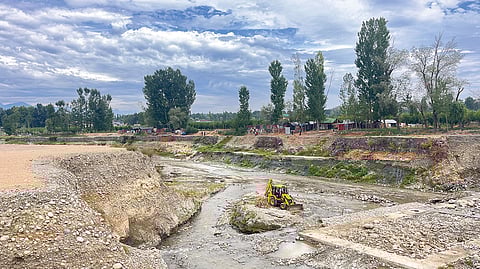 An almost dried-up Doodh Ganga river in Budgam district, Jammu and Kashmir, in August 2024. Once a lifeline for households in the district, the river remains in a dire state even two years after the National Green Tribunal’s blanket ban on riverbed mining