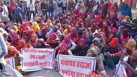 Women from villages surrounding Rajasthan’s Hanumangarh municipal council during a protest on February 13, 2025, against the state government’s decision to merge their villages into Hanumangarh town