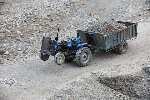 Vehicles carrying illegally mined sand from Kosi's riverbed.