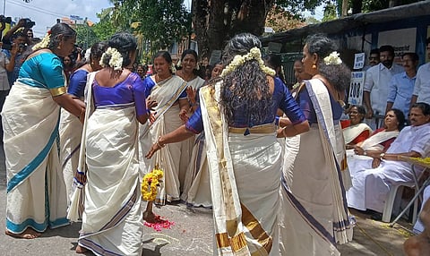 Onasadhya on the pavement: Kerala’s ASHA workers mark 209 days of hunger and hope
