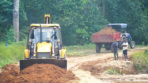 Residents of Jabarra contribute funds and labour to construct a causeway on the Kajal river every year using wild grass, sand and cement