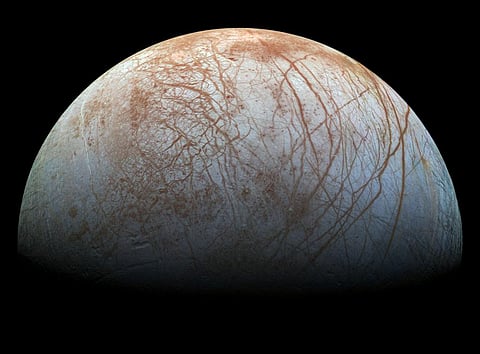 The puzzling, fascinating surface of Jupiter's icy moon Europa looms large in this reprocessed color view, made from images taken by NASA's Galileo spacecraft in the late 1990s. Photo: NASA/JPL-Caltech/SETI Institute