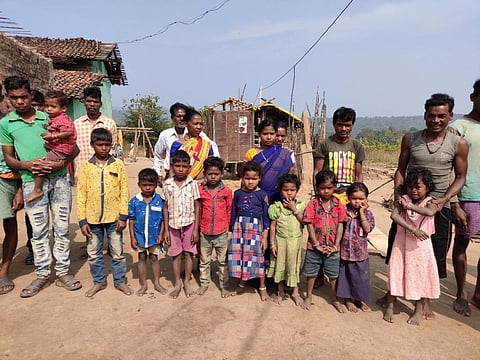 Children and a few elders of Nangalghat village of Sinapali block in Odisha. Other members of the family have migrated to work in brick kilns. Photo: Ajit Panda
