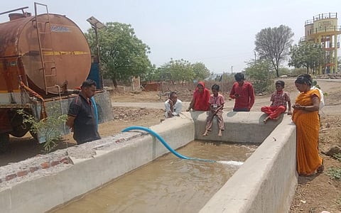 Residents of a Marathwada village getting precious water from a tanker. Photo: Dhananjay Gundekar