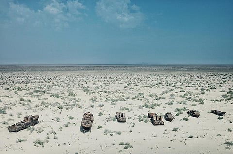 Abandoned boats rusting away in the sand at the once blooming sea port of Moynaq, Uzbekistan. Photo: iStock