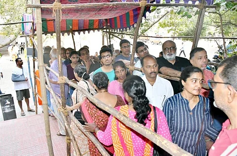 Voters going inside and coming out of a polling booth in Chennai. Photo: Shivani Chaturvedi