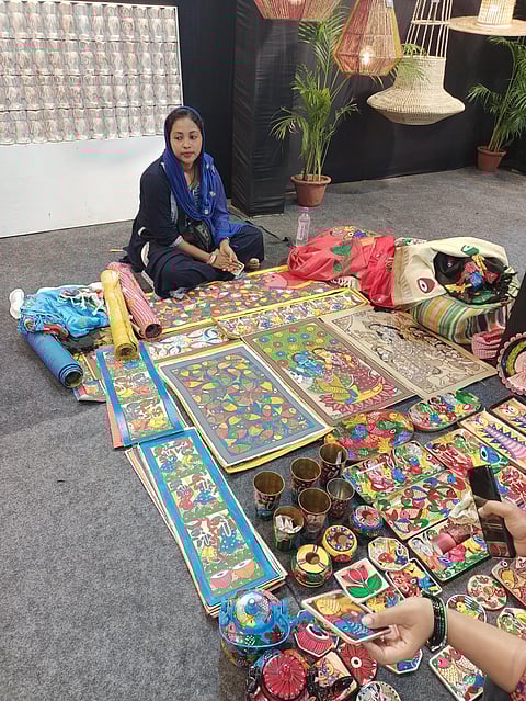 A patachitra artist from Naya selling her products at an exhibition in Kolkata. Photo: Author provided
