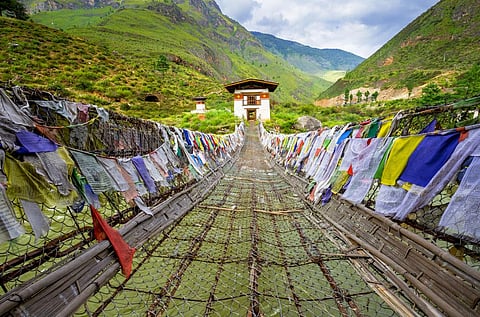 Tourists in Bhutan pay a daily fee of $100 per night that helps fund local community services and limits tourist numbers to prevent overtourism. Photo: iStock