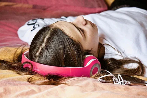 wearing headphones while sleeping